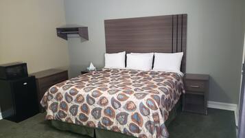 Desk, laptop workspace, blackout drapes, iron/ironing board