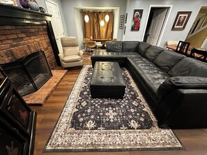 Smart TV, fireplace, books, music library