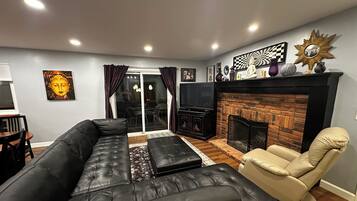 Smart TV, fireplace, books, music library