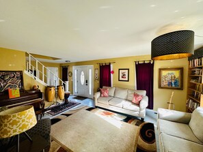 Smart TV, fireplace, books, music library