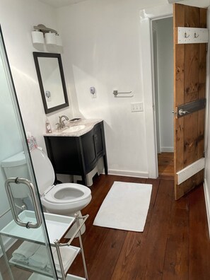 Combined shower/tub, hair dryer, towels, soap