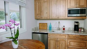 Fridge, microwave, coffee/tea maker, toaster