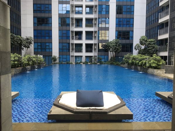 Outdoor pool - 2BR in New Tower, Casagrande Residence, Kota Kasablanka (Jakarta)