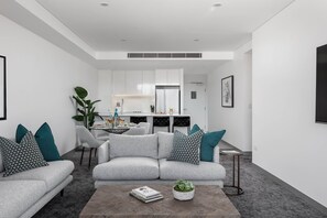 2 Bedroom Apartment | Living area | 65-inch Smart TV with satellite channels, TV, Netflix - Argo Serviced Apartments (Wollongong)