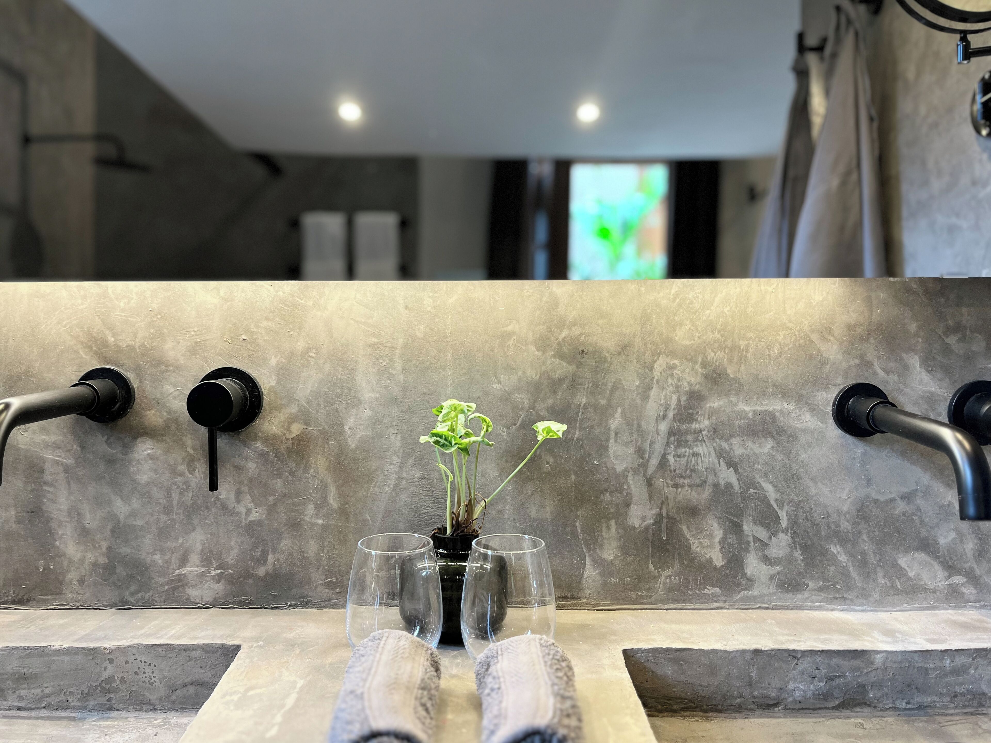 the grand loft suite | bathroom | designer toiletries, hair dryer, bathrobes, slippers