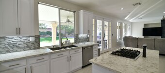 Modern home 12 min from strip, Swimming pool , , enclosed yard, backyard oasis