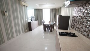 Apartment, 1 Bedroom | Living area | LCD TV - Apatel Ancol Mansion (Jakarta)