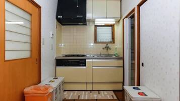 Villa | Private kitchen | Fridge, microwave, stovetop