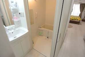 Standard Room | Bathroom | Combined shower/tub, hair dryer, electronic bidet, towels