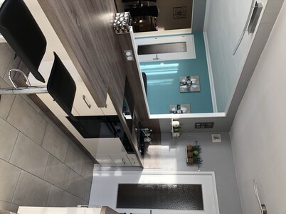 Spacious apartment with large terrace. Close to tram line.