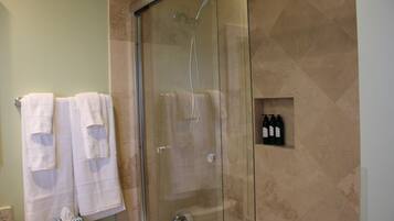 Bathtub, hair dryer, towels, soap