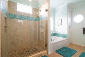 Bathtub, hair dryer, towels, soap