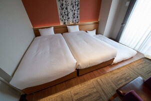 Deluxe Twin Room | Desk, iron/ironing board, free WiFi, bed sheets