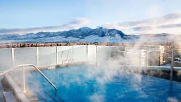 Outdoor pool, open 8:00 AM to 10:00 PM, pool umbrellas