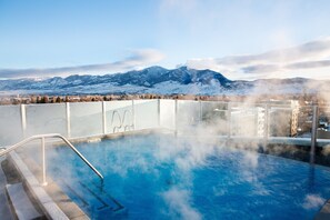 Outdoor pool, open 8:00 AM to 10:00 PM, pool umbrellas - Kimpton Armory Hotel Bozeman by IHG (Bozeman)