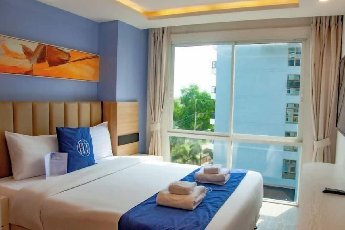 2 habitaciones, minibar y caja de seguridad en la habitación