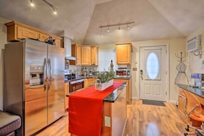 Fridge, microwave, stovetop, cookware/dishes/utensils