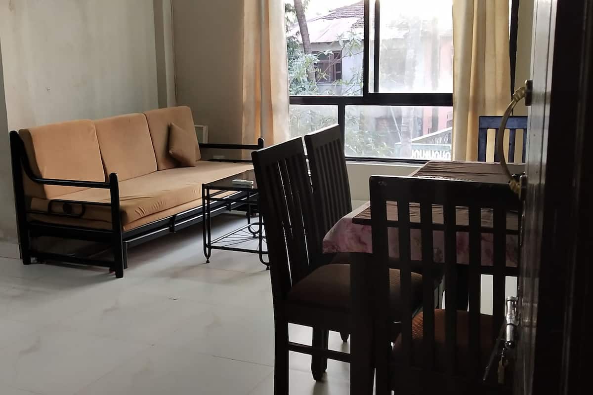 Superior Apartment | Living room | 32-inch LED TV with cable channels, TV, first-run movies