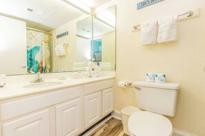 Combined shower/bathtub, hair dryer, towels, soap
