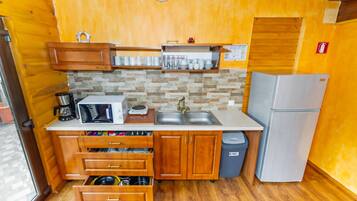 Microwave, coffee/tea maker, cookware/dishes/utensils