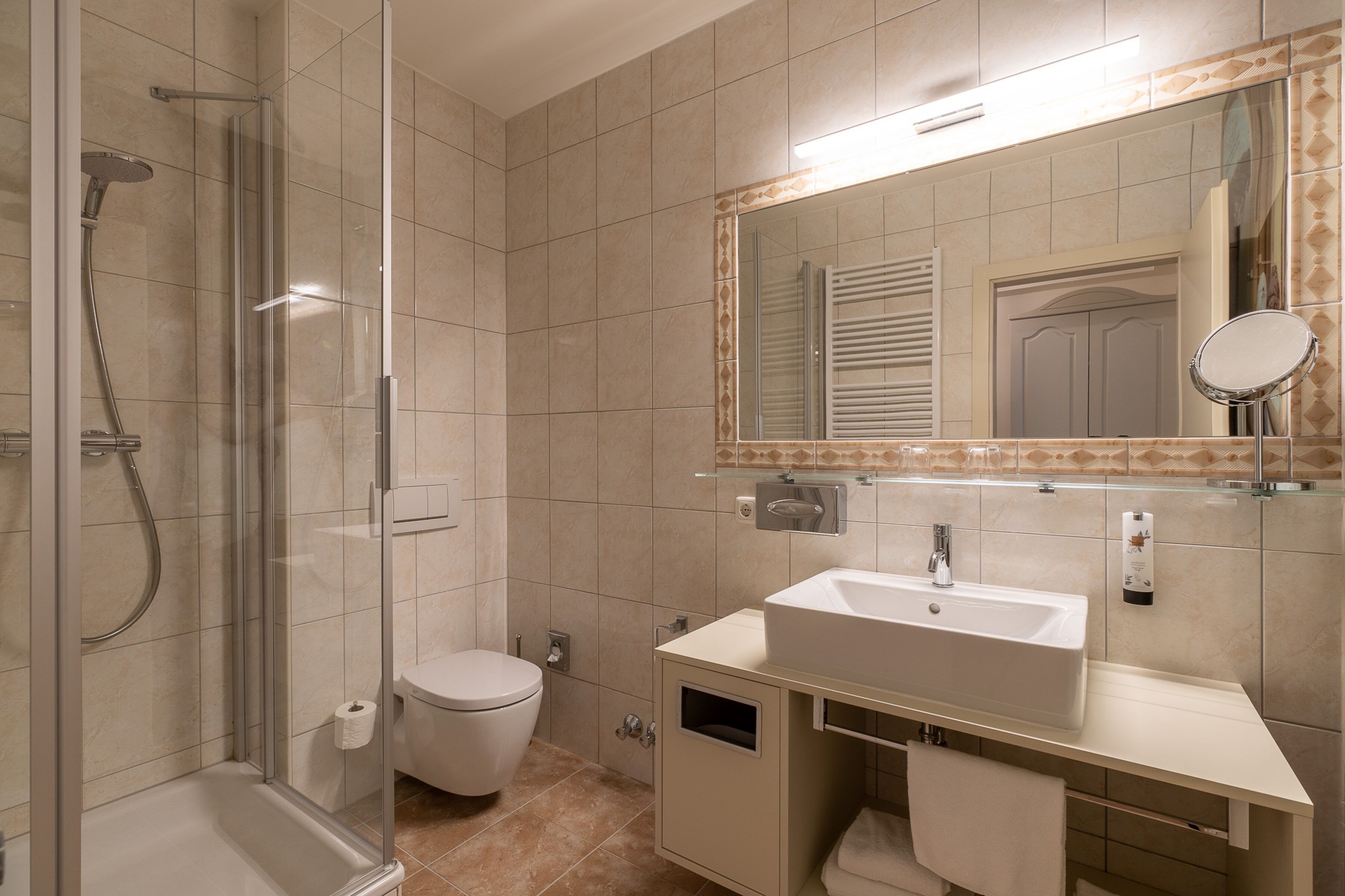 hair dryer, towels, soap, shampoo