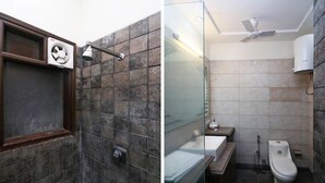 A bathroom with a shower, a toilet, and a sink. - Amar Villa One (New Delhi)