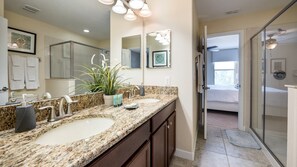 A bathroom with two sinks, a shower, and a walk-in closet. - Luxury 8 Bedroom Villa on Champions Gate Resort, Orlando Villa 3317 (Davenport)