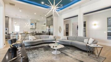 Villa (1 Bedroom) | Living room | Flat-screen TV, fireplace, foosball, table tennis