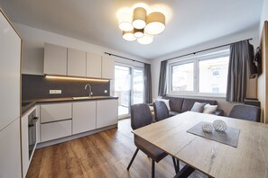 Apartment (Tristkogel) | Wohnbereich | Fernseher