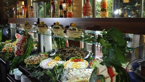 A buffet with various dishes and a selection of condiments. - Noxinn Club Hotel  (Alanya)