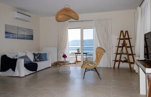 Deluxe Apartment, 2 Bedrooms, Sea View | Living area | Smart TV