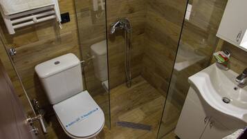 Shower, free toiletries, hair dryer, towels