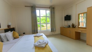Deluxe kamer | Badkamer | Pantoffels, handdoeken