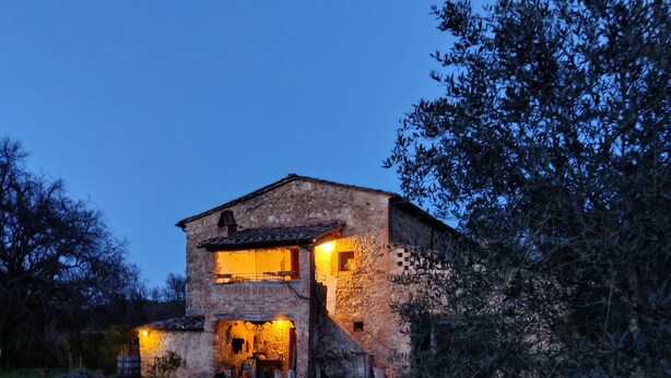 A rustic stone building with a two-story structure, a front entrance, and a small porch area. - la Casa - Agriturismo With Pool Between Siena and Grosseto (Civitella Paganico)