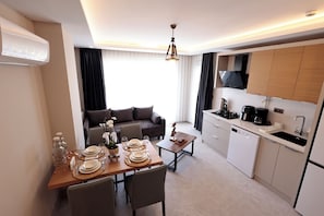 Luxury Condo, 1 Double Bed with Sofa bed, Hot Tub, City View | Private kitchen | Full-size fridge, microwave, oven, stovetop