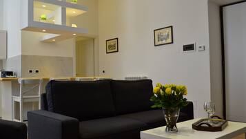 Apartamento, 2 quartos, geladeira | Lounge