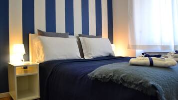 Apartamento, 2 quartos, geladeira | 2 quartos, berço de viagem