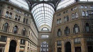 A spacious, ornate interior with a high, glass-domed ceiling and classical architecture. - Dependance Naples City Centre (Naples)