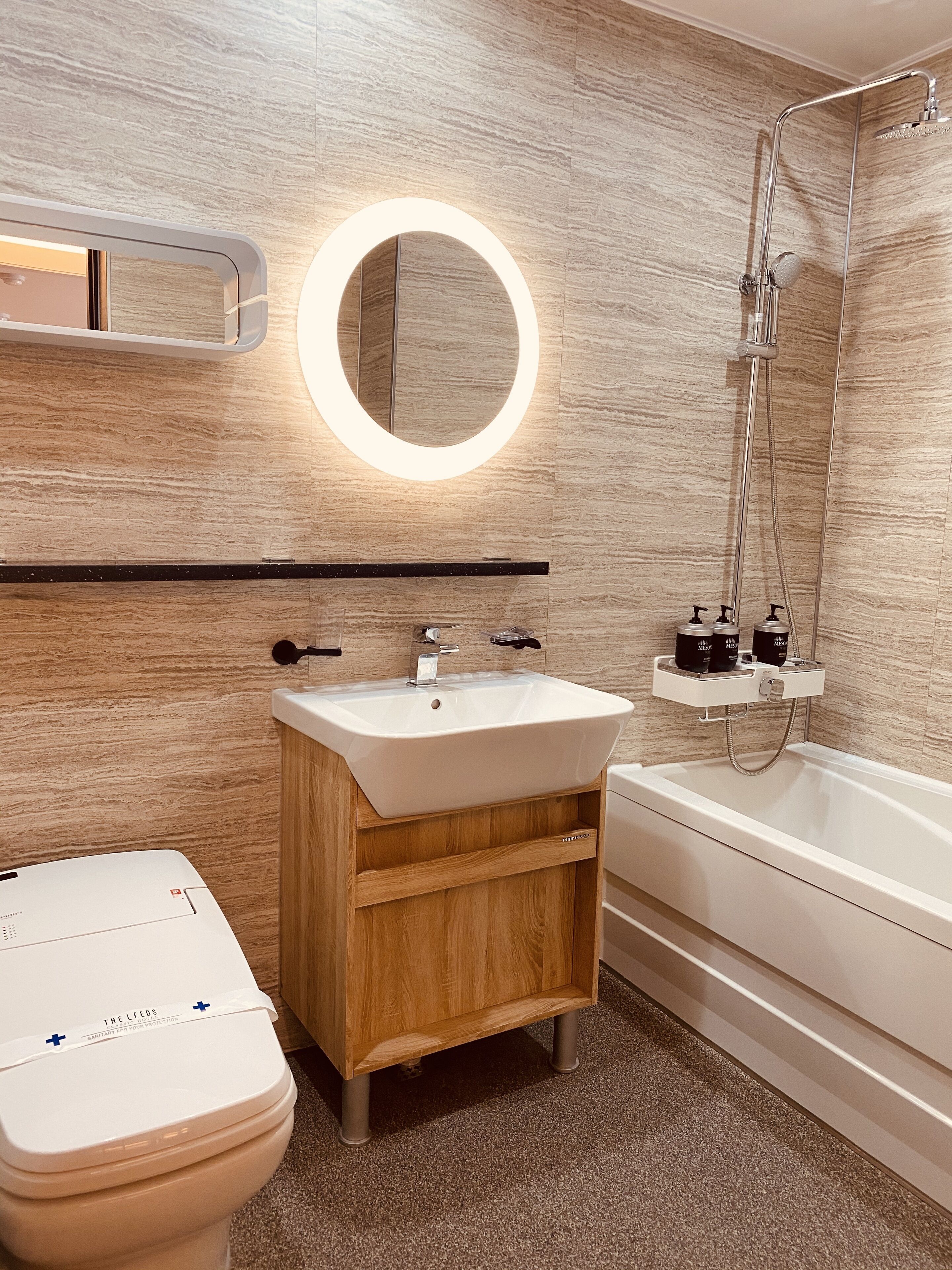 suite | bathroom | rainfall showerhead, free toiletries, hair dryer, dressing gowns