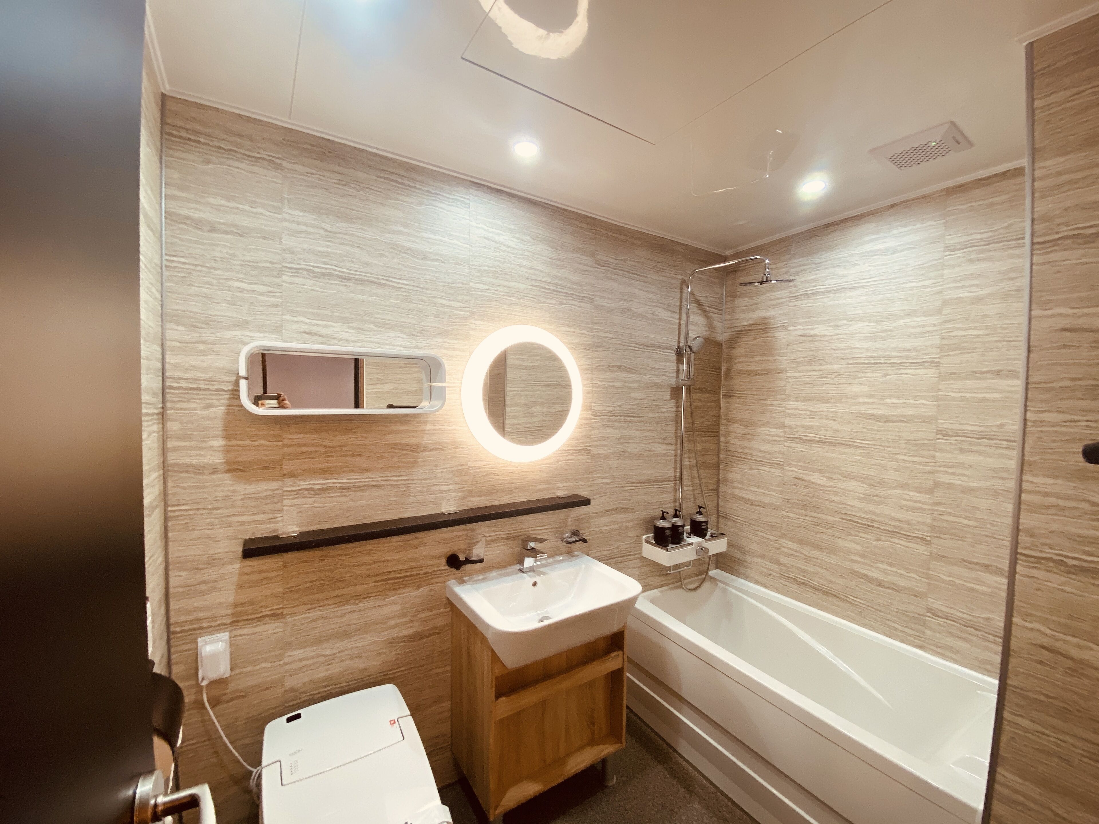 suite | bathroom | rainfall showerhead, free toiletries, hair dryer, dressing gowns