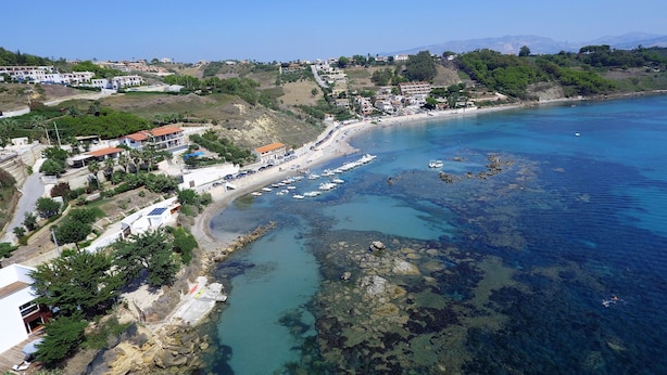 A coastal town with a beach, boats, and residential buildings. - Studio 200 Meters From the Sea, Wifi, Self Catering (Sciacca)