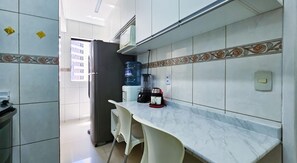 Private kitchen - Exclusive apartment for seasonal rental. (Pituba)