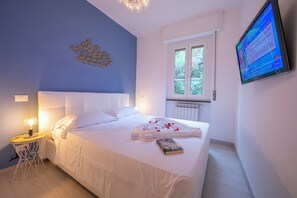 1 habitación, tabla de planchar con plancha, wifi gratis y ropa de cama 