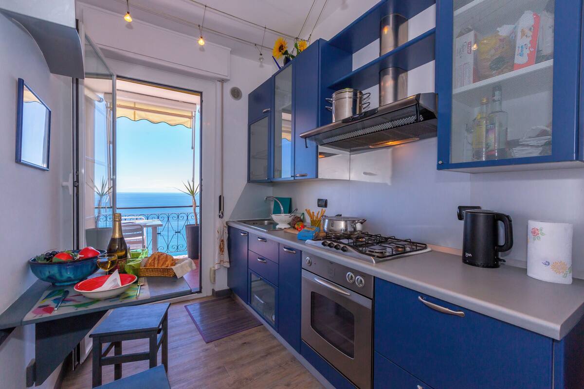 Family Apartment, 1 Bedroom (La Casa al Sole - beautiful sea view) | Private kitchen | Coffee/tea maker, full-size fridge, oven, stovetop