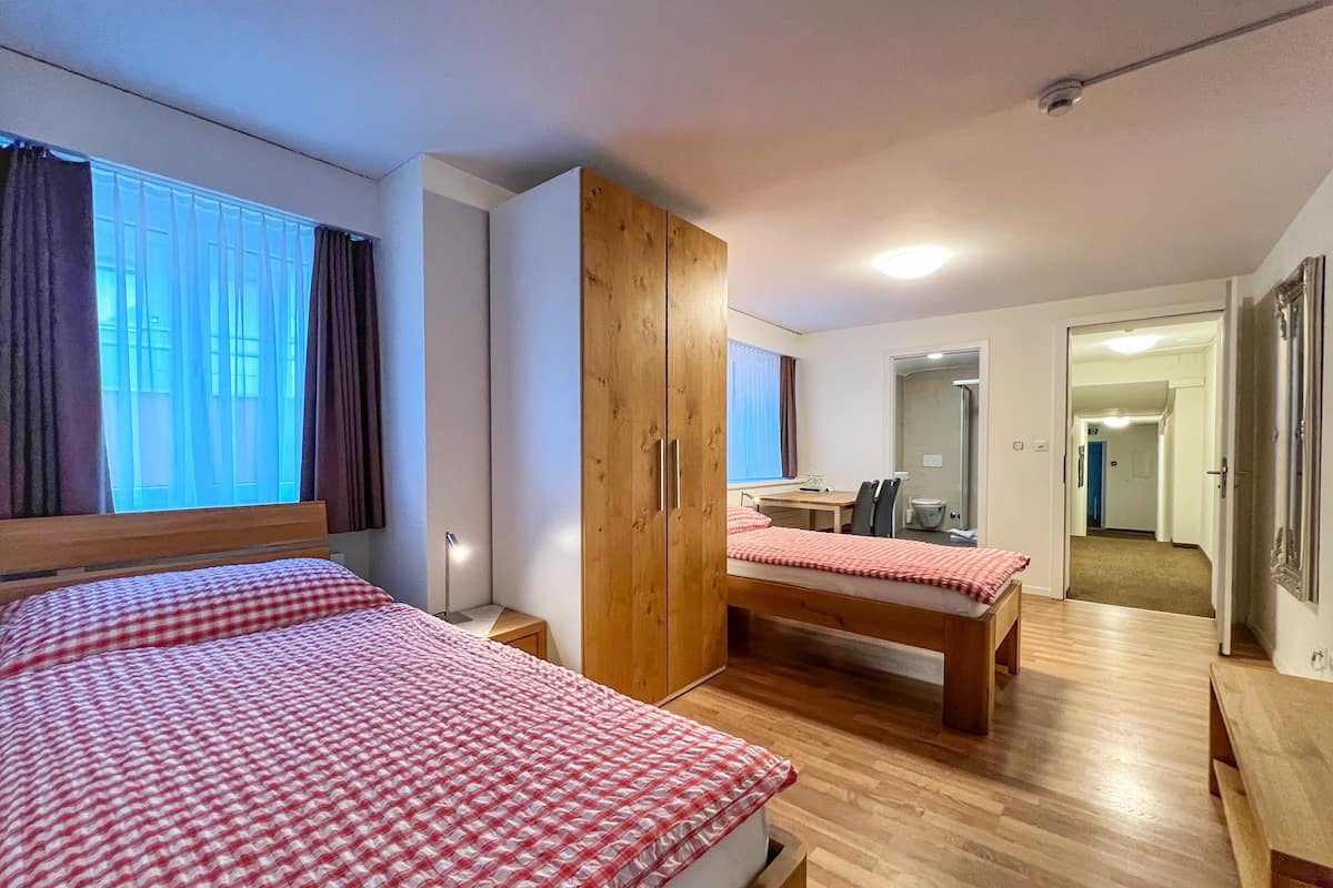 Quadruple Room | Down comforters, desk, free WiFi, bed sheets