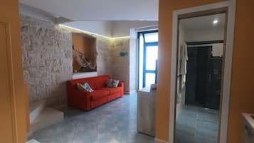 Studio, 1 Bedroom, Smoking, City View | Living area