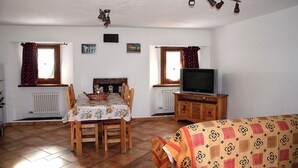 Apartment, 1 Bedroom | Living area | TV - Appartamento Con Giardino (Villeneuve)