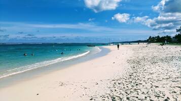 On the beach, white sand