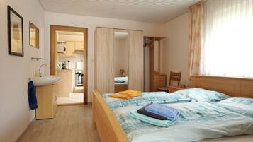 2 bedrooms, travel crib, WiFi, bed sheets