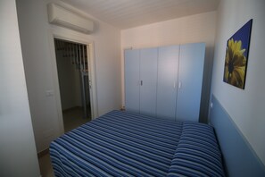 Apartment, 2 Bedrooms, Balcony, Ocean View | 2 bedrooms, iron/ironing board, travel crib, WiFi